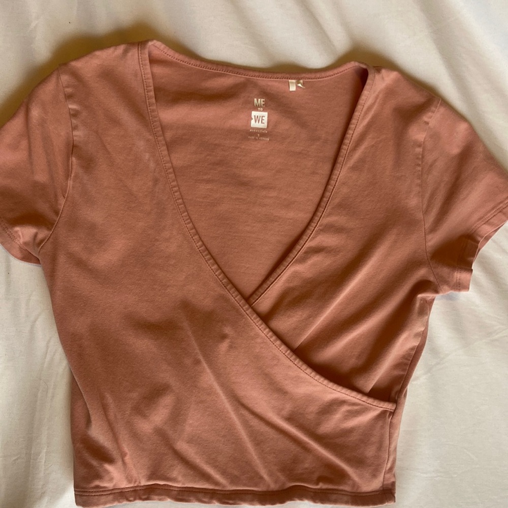 Super cute light pink cropped crossover tshirt from Pac Sun size smaller
